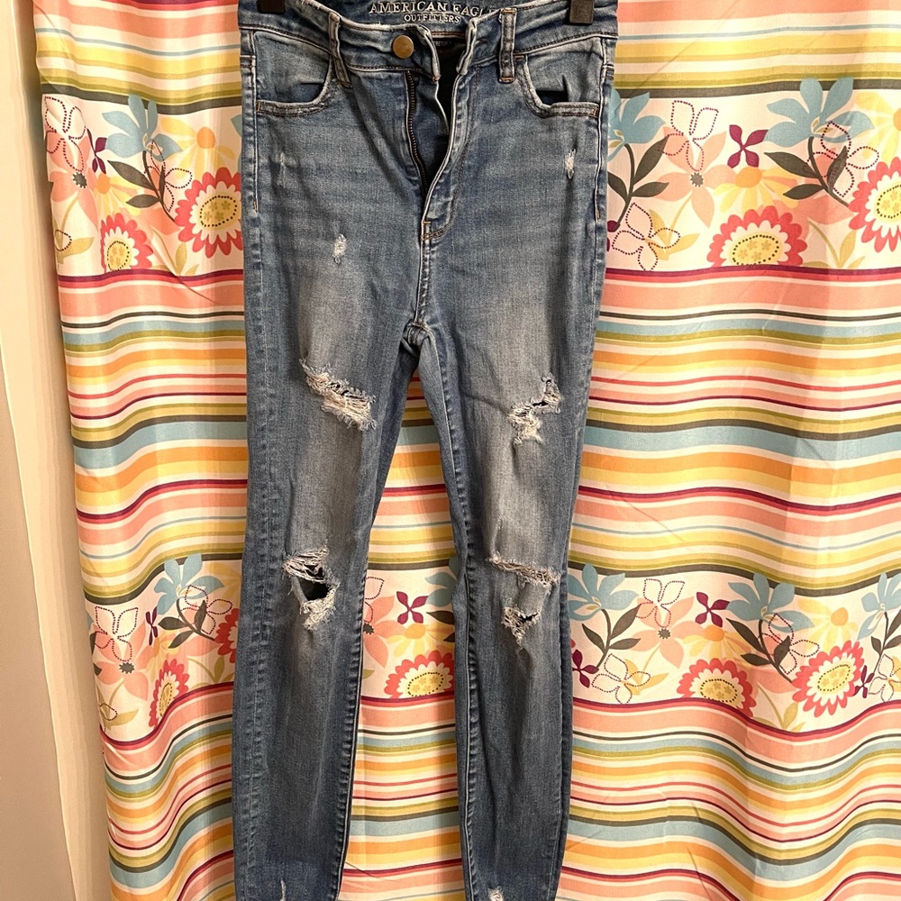 American Eagle ripped skinny jeans, high-waisted. Medium blue color.
